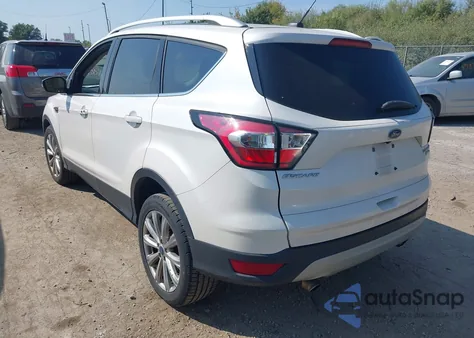 2017 Ford Escape Titanium z USA, uszkodzony, nr VIN 1FMCU9J94HUC20180